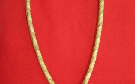Rawhide Bosalita braided with horse hide with red string