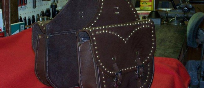 Harness leather saddle bags, with brass spots